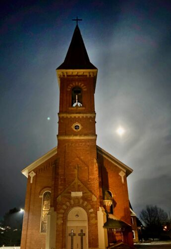 Lunar rise: Moon shines over church west of Marietta